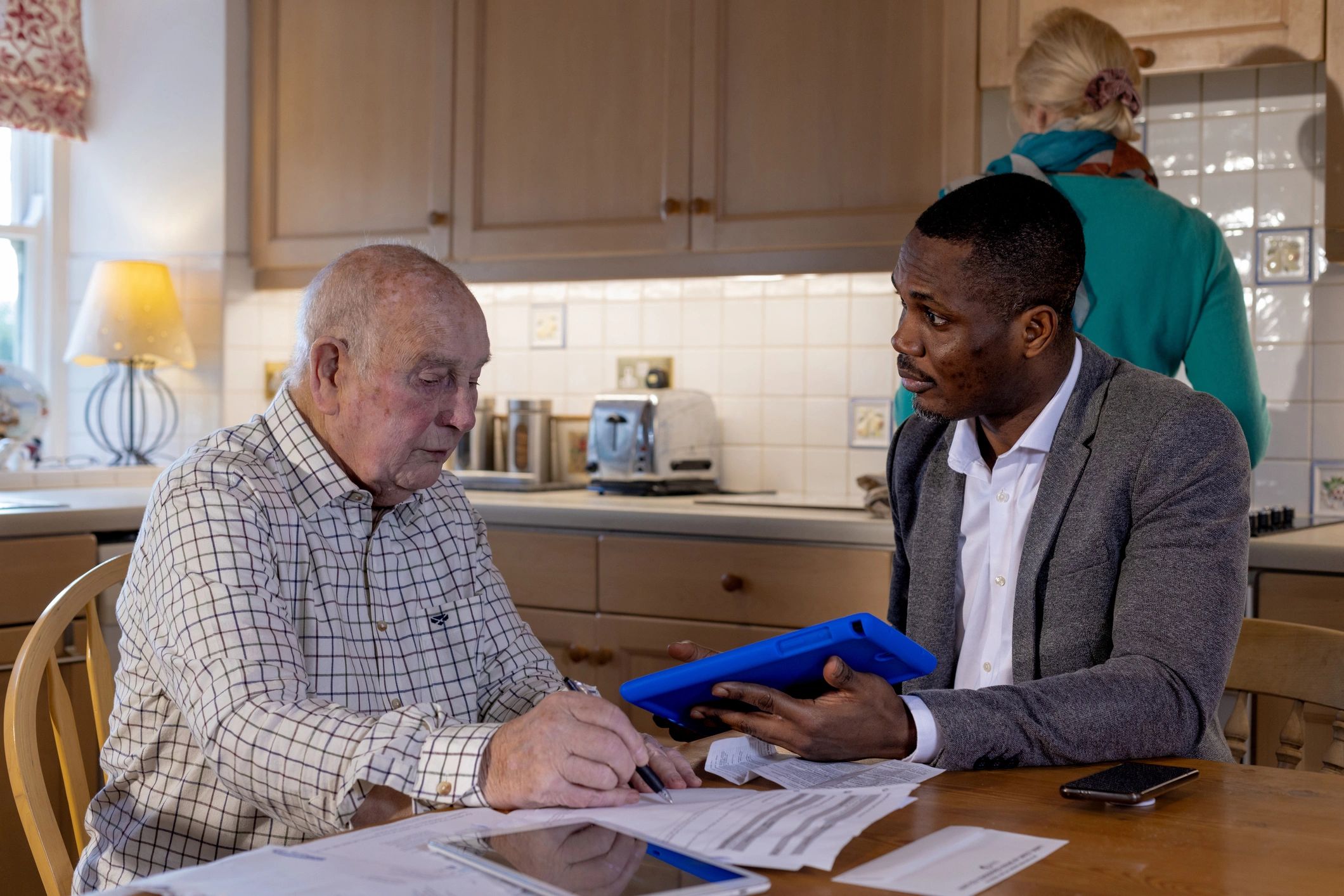 Consultant reviewing documents with a client