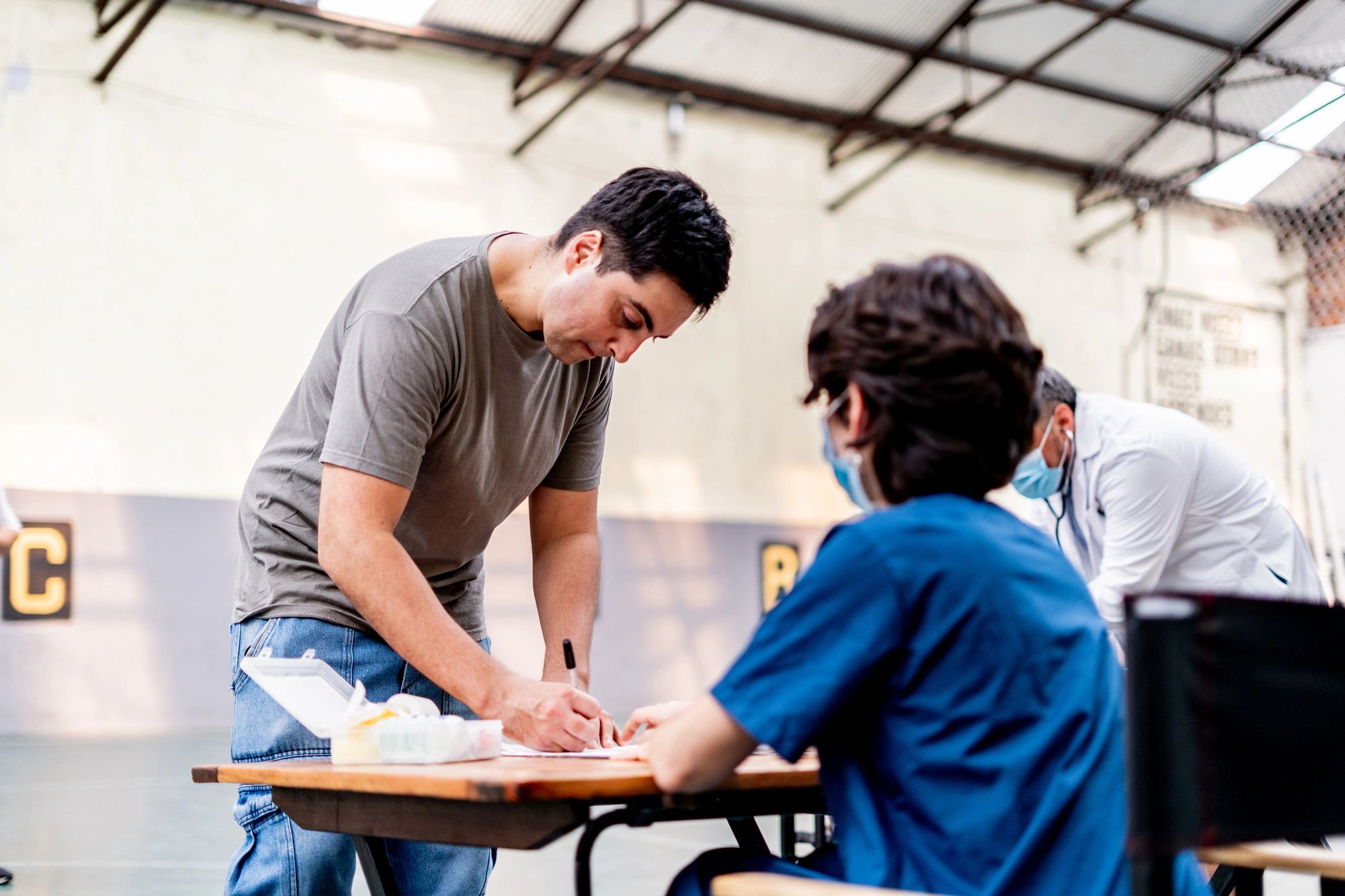 Client signing documents during a consultation